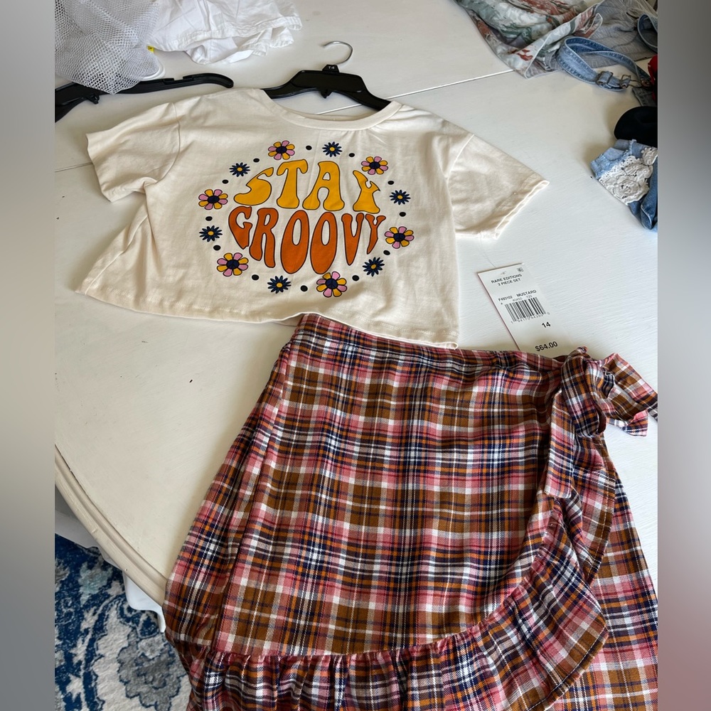 Girls Rare Editions 2 piece tee and skirt. New with tags.